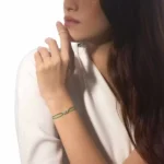 Move Uno green cord bracelet