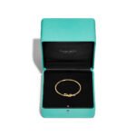 Tiffany Knot Wire Bangle in Yellow Gold